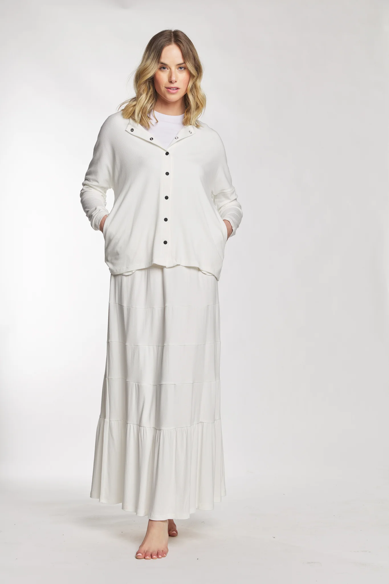 White Ribbed Button Up Top With Black Snaps And A Thin Pocket